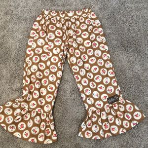 Tan colored ruffle capris